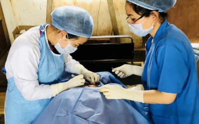 Dr K Keditsu conducting surgical procedure