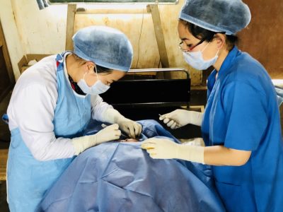 Dr K Keditsu conducting surgical procedure